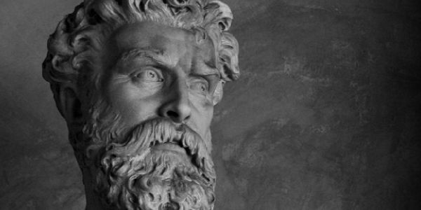 Buste sculpté en pierre incarnant la philanthropie et la gestion privée pour AXA Troyes